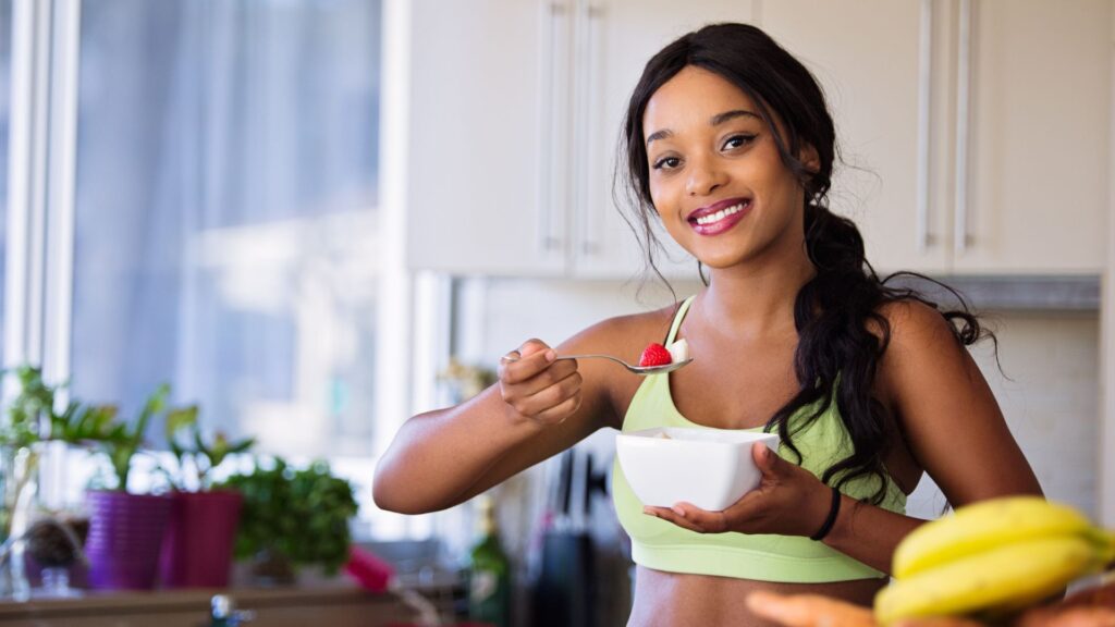 A woman eating berries