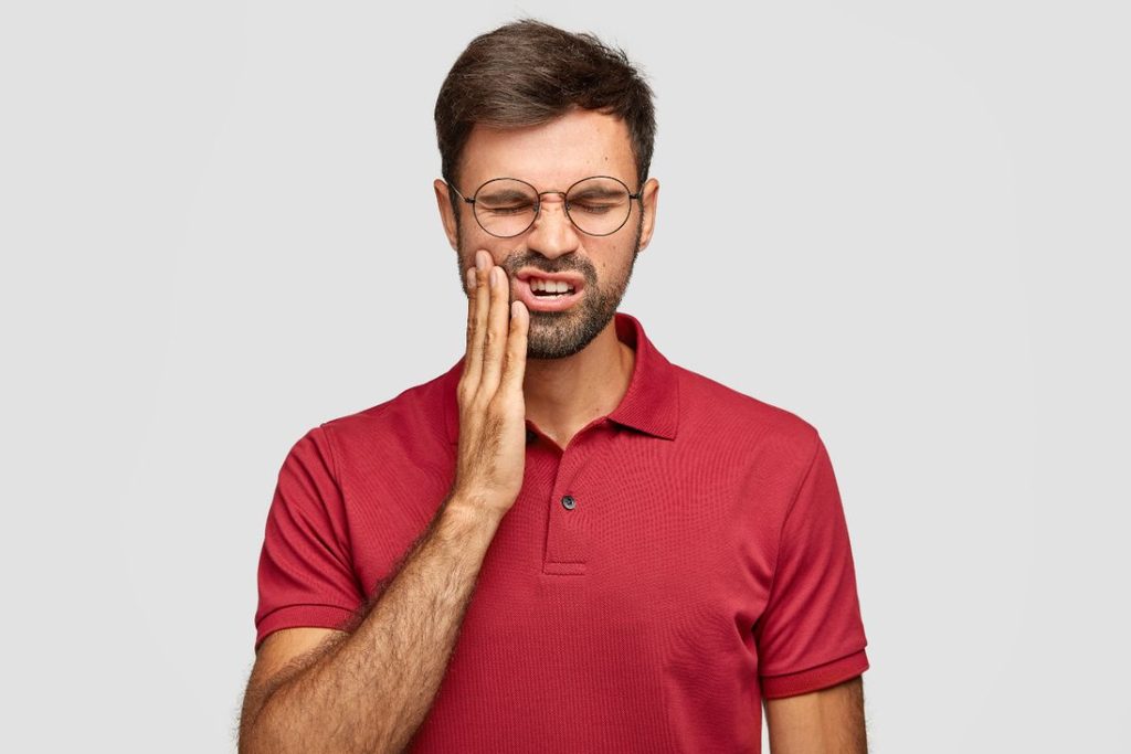 man with a toothache